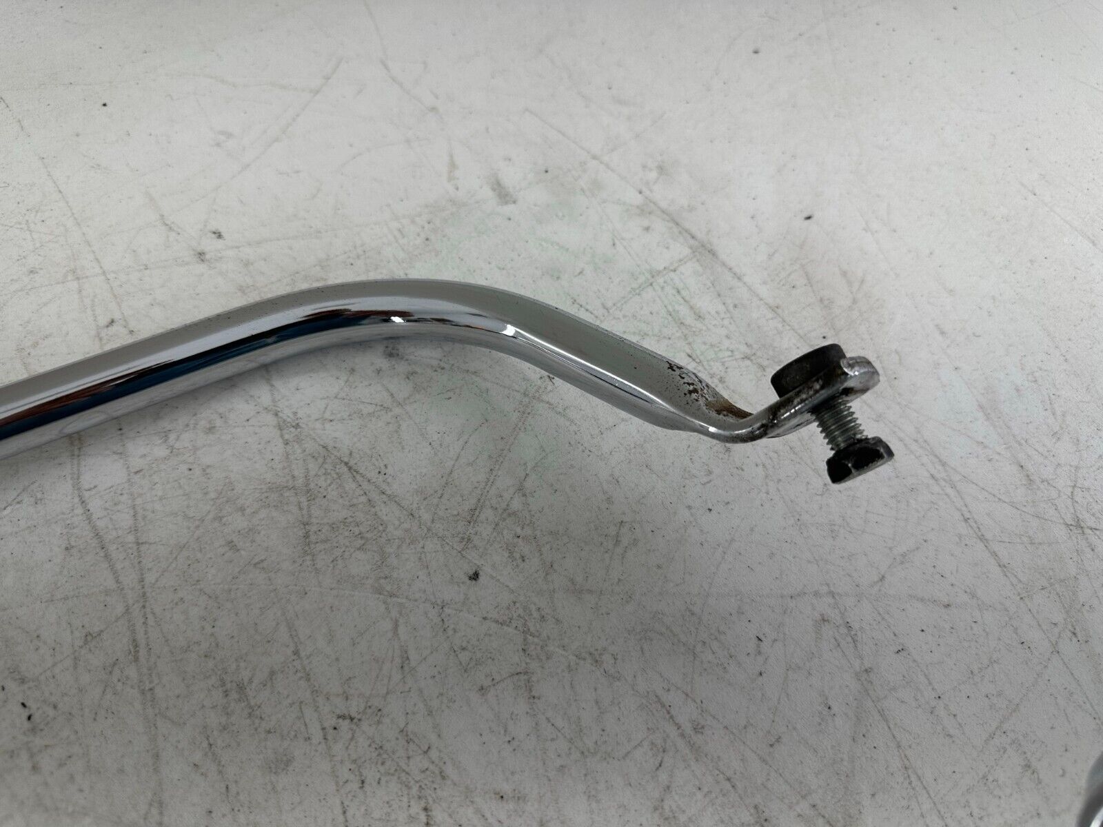 2005 HARLEY FLH ROADKING Saddlebag Lower Chrome Trim Exhaust Mounting Bracket