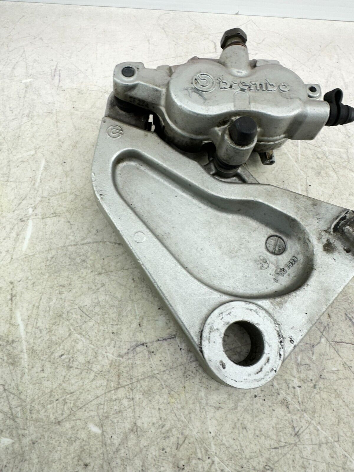 2006 Victory Kingpin Rear Brake Caliper + Mounting Bracket Brembo