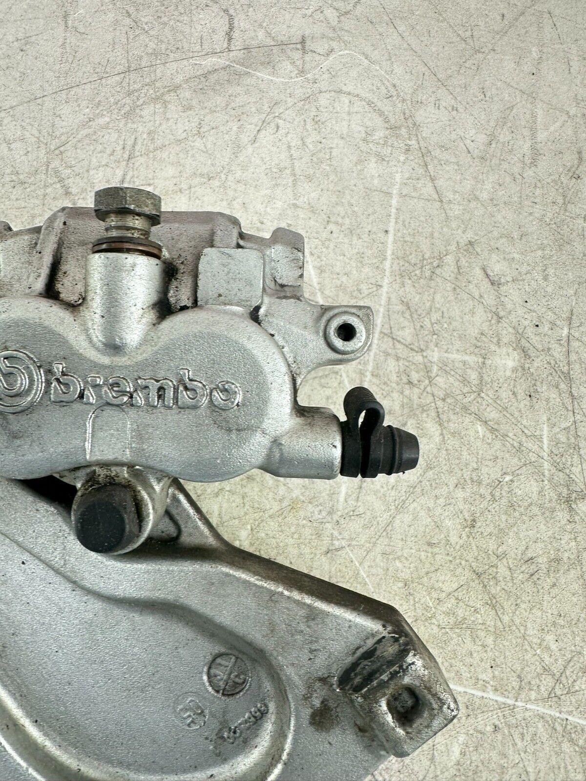 2006 Victory Kingpin Rear Brake Caliper + Mounting Bracket Brembo